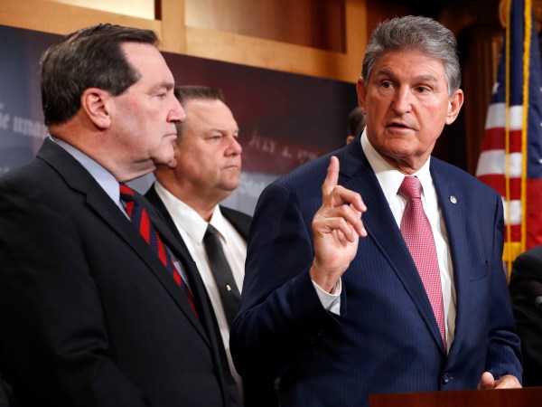 Sen. Joe Manchin, D-W.Va., right, with Sen. Joe Donnelly, D-Ind., left, and Sen. Jon Tester, D-Mont., speaks about tax reform, Tuesday, Nov. 28, 2017, on Capitol Hill in Washington. (AP Photo/Jacquelyn Martin)