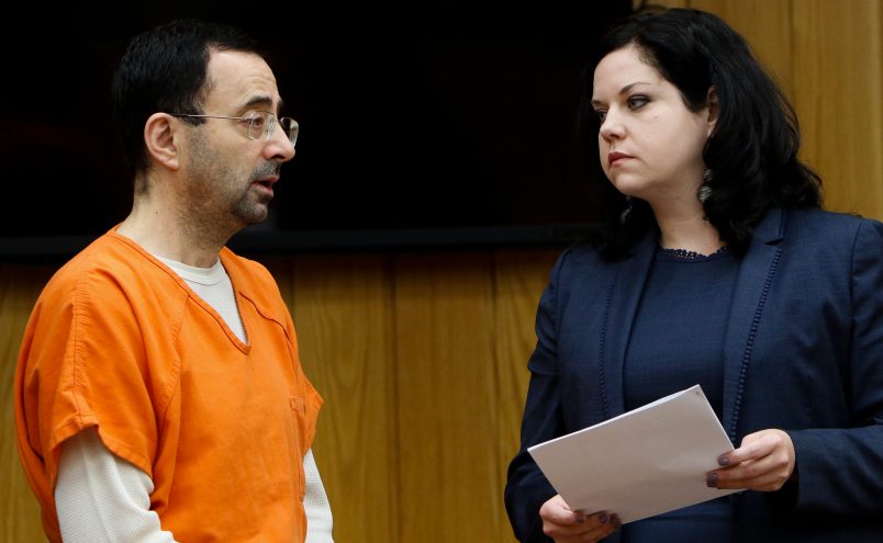 Former gymnastics doctor Larry Nassar pleads guilty to three counts of first-degree criminal sexual conduct Wednesday, Nov. 29, 2017, in Judge Janice Cunningham's courtroom in Eaton County.  Also pictured is his attorney Shannon Smith.