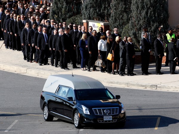Mourners file into a funeral for Baltimore Police Det. Sean Suiter at Mount Pleasant Church in Baltimore, Wednesday, Nov. 29, 2017. Suiter died a day after being shot while investigating a homicide case in a particularly troubled area of west Baltimore. (AP Photo/Patrick Semansky)