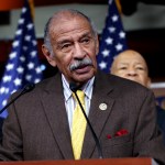 FILE -- In this file photo from Tuesday, Feb. 14, 2017, Rep. John Conyers, D-Mich., center, flanked by Rep. Richard Neal, D-Mass., left, and Rep. Elijah Cummings, D-Md., says they want an investigation into President Donald Trump's relationship with Russia, on Capitol Hill in Washington. Top House Democrat Nancy Pelosi said today, Thursday, Nov. 30, 2017, that Rep. Conyers, should resign in the face of multiple accusations of sexual misconduct, calling them serious, disappointing and very credible.    (AP Photo/J. Scott Applewhite, file)