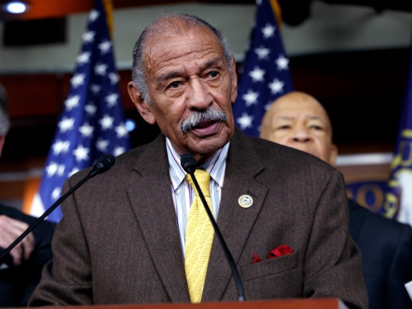 FILE -- In this file photo from Tuesday, Feb. 14, 2017, Rep. John Conyers, D-Mich., center, flanked by Rep. Richard Neal, D-Mass., left, and Rep. Elijah Cummings, D-Md., says they want an investigation into President Donald Trump's relationship with Russia, on Capitol Hill in Washington. Top House Democrat Nancy Pelosi said today, Thursday, Nov. 30, 2017, that Rep. Conyers, should resign in the face of multiple accusations of sexual misconduct, calling them serious, disappointing and very credible.    (AP Photo/J. Scott Applewhite, file)