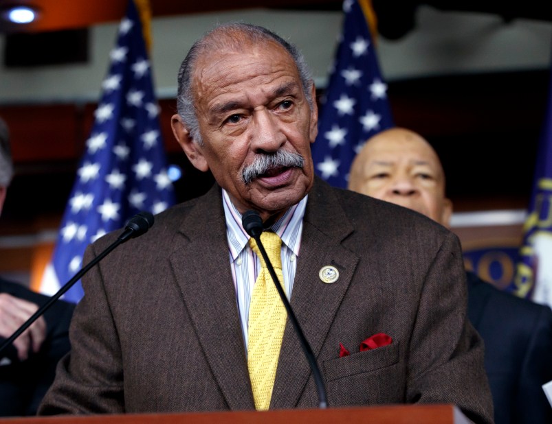 FILE -- In this file photo from Tuesday, Feb. 14, 2017, Rep. John Conyers, D-Mich., center, flanked by Rep. Richard Neal, D-Mass., left, and Rep. Elijah Cummings, D-Md., says they want an investigation into President Donald Trump's relationship with Russia, on Capitol Hill in Washington. Top House Democrat Nancy Pelosi said today, Thursday, Nov. 30, 2017, that Rep. Conyers, should resign in the face of multiple accusations of sexual misconduct, calling them serious, disappointing and very credible.    (AP Photo/J. Scott Applewhite, file)