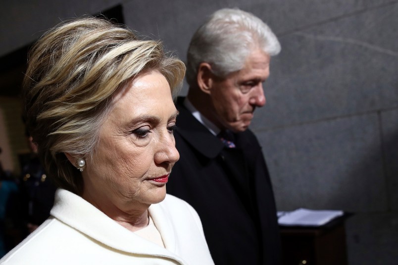 WASHINGTON, DC - JANUARY 20:  Former Democratic presidential nominee Hillary Clinton (L) and former President Bill Clinton arrive on the West Front of the U.S. Capitol on January 20, 2017 in Washington, DC. In today's inauguration ceremony Donald J. Trump becomes the 45th president of the United States.  (Photo by Win McNamee/Getty Images)