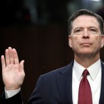 Former FBI Director James Comey is sworn in during a Senate Intelligence Committee hearing on Capitol Hill, Thursday, June 8, 2017, in Washington. (AP Photo/Alex Brandon)