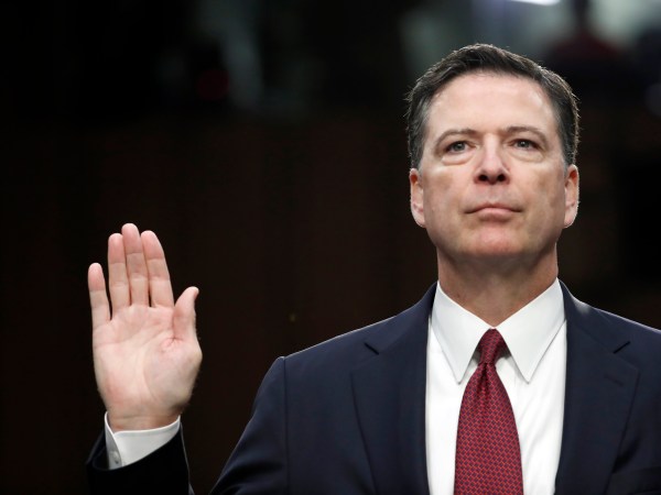 Former FBI Director James Comey is sworn in during a Senate Intelligence Committee hearing on Capitol Hill, Thursday, June 8, 2017, in Washington. (AP Photo/Alex Brandon)