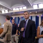 Jim Acosta of CNN waits to do a live shot following the daily briefing at the White House in Washington, Wednesday, Aug. 2, 2017. (AP Photo/Susan Walsh)