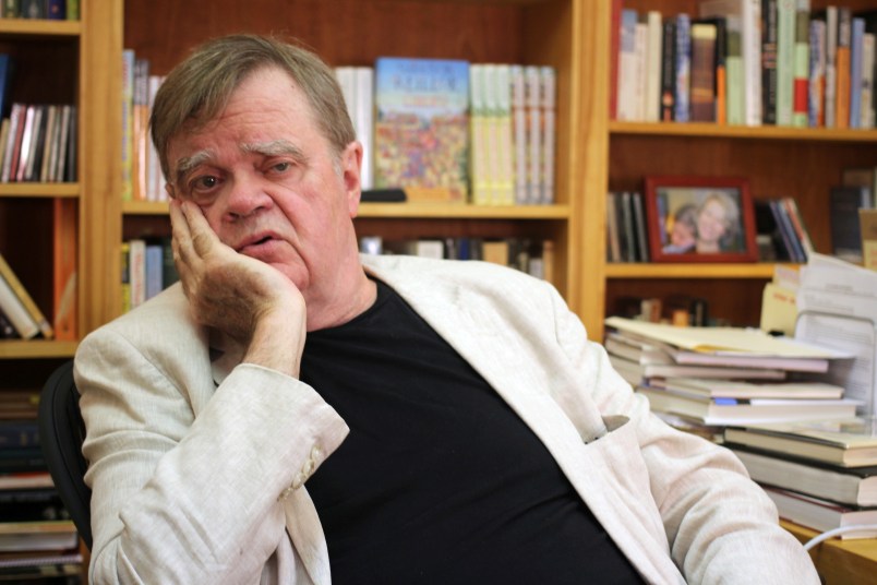 In this July 26, 2017 photo, “A Prairie Home Companion” creator and former host Garrison Keillor talks at his St. Paul, Minn., office. Keillor is not spending his time in retirement baking Powdermilk Biscuits or drinking coffee down at the Chatterbox Cafe now that he has hung up his microphone as host of his popular public radio show “A Prairie Home Companion.” He turns 75 on Aug. 7 and boards a bus the next day for a 28-city “Prairie Home Love & Comedy Tour _ 2017,” which he vows will be his last. (AP Photo/Jeff Baenen)