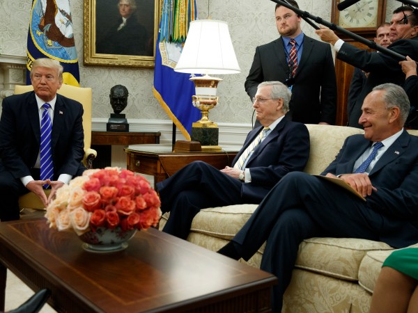 Senate Majority Leader Mitch McConnell, R-Ky., center, and Senate Minority Leader Chuck Schumer, D-N.Y., right, listen as President Donald Trump speaks during a meeting with Congressional leaders in the Oval Office of the White House, Wednesday, Sept. 6, 2017, in Washington. (AP Photo/Evan Vucci)