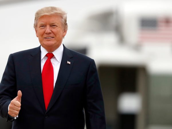 President Donald Trump gives thumbs up as he boards Air Force One as he departs Wednesday, Oct. 11, 2017, at Andrews Air Force Base, Md. Trump is going to Harrisburg, Pa. (AP Photo/Alex Brandon)