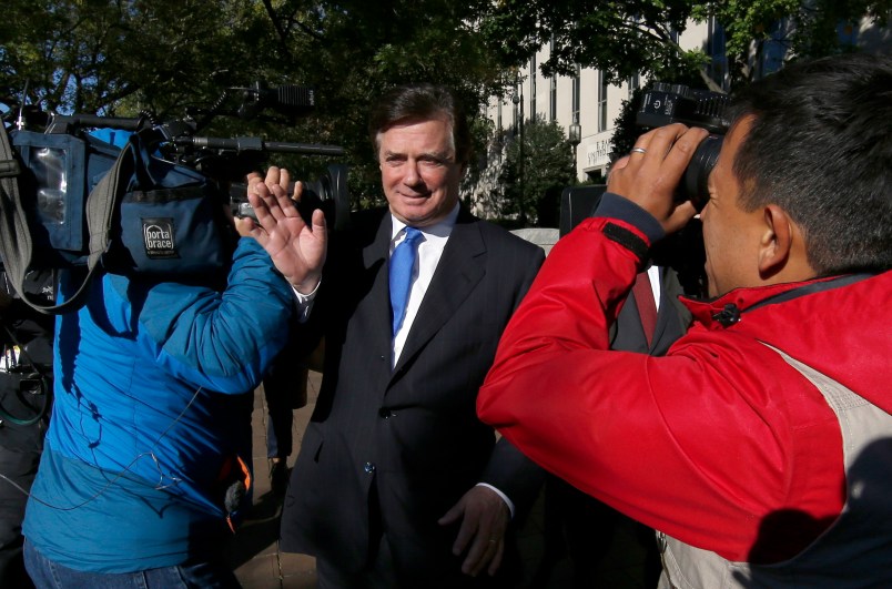 Paul Manafort, President Donald Trump's former campaign chairman, departs at Federal District Court in Washington, Monday, Oct. 30, 2017. Manafort, and a former business associate, Rick Gates, have been told to surrender to federal authorities Monday, according to reports and a person familiar with the matter. (AP Photo/Alex Brandon)