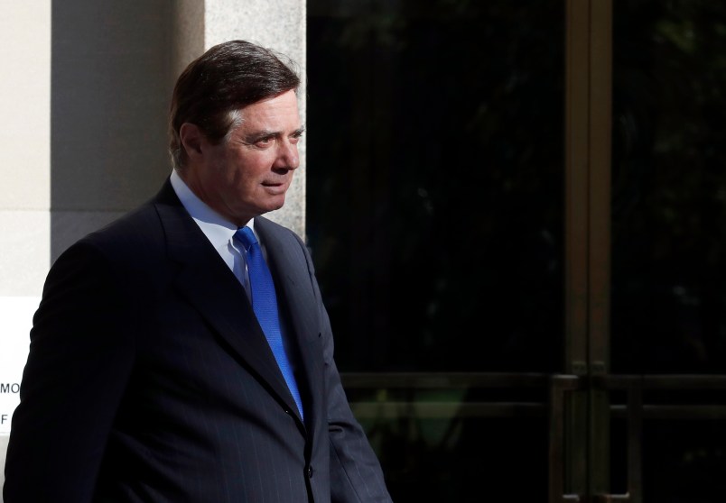 Paul Manafort, President Donald Trump's former campaign chairman, departs Federal District Court in Washington, Monday, Oct. 30, 2017. Manafort, and a former business associate, Rick Gates, have been told to surrender to federal authorities Monday, according to reports and a person familiar with the matter. (AP Photo/Alex Brandon)