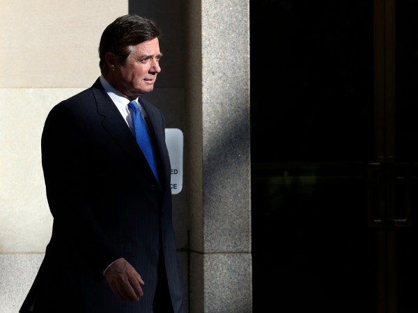 Paul Manafort walks from Federal District Court in Washington, Monday, Oct. 30, 2017. Manafort, President Donald Trump's former campaign chairman, and Manafort's business associate Rick Gates pleaded not guilty to felony charges of conspiracy against the United States and other counts. (AP Photo/Alex Brandon)