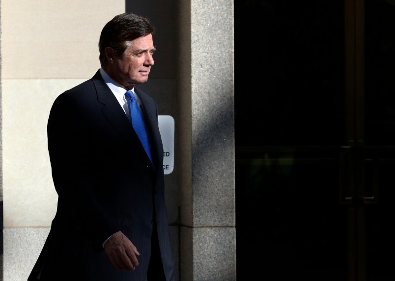 Paul Manafort walks from Federal District Court in Washington, Monday, Oct. 30, 2017. Manafort, President Donald Trump's former campaign chairman, and Manafort's business associate Rick Gates pleaded not guilty to felony charges of conspiracy against the United States and other counts. (AP Photo/Alex Brandon)