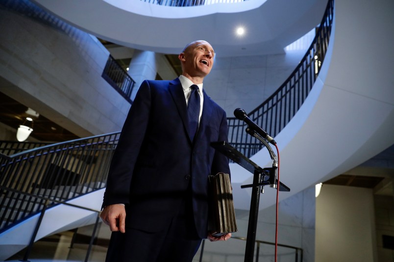 Carter Page, a foreign policy adviser to Donald Trump’s 2016 presidential campaign, speaks with reporters briefly following a day of questions from the House Intelligence Committee, on Capitol Hill in Washington, Thursday, Nov. 2, 2017. (AP Photo/J. Scott Applewhite)