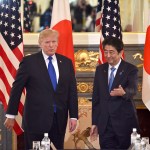 US President Donald Trump (L) is led by Japanese Prime Minister Shinzo Abe (R) before a summit meeting at Akasaka Palace in Tokyo on November 6, 2017. / AFP PHOTO / POOL / Kazuhiro NOGI /// Attn photo desk (AFP POOL-Trump/Abe summit meeting-7) Herewith AFP POOL photo, 110607F. 110607F: US President Donald Trump (L ) is led by Japanese Prime Minister Shinzo Abe (R ) before a summit meeting at Akasaka Guest House in Tokyo on November 6, 2017. AFP PHOTO / POOL / Kazuhiro NOGICheers, Nogi/tokpix