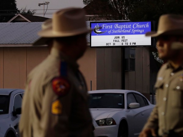 Law enforcement officials work at the scene of a shooting at the First Baptist Church of Sutherland Springs, Monday, Nov. 6, 2017, in Sutherland Springs, Texas. A man dressed in black tactical-style gear and armed with an assault rifle opened fire inside the church in the small South Texas community on Sunday, killing and wounding many. The dead ranged in age from 5 to 72 years old. (AP Photo/Eric Gay)