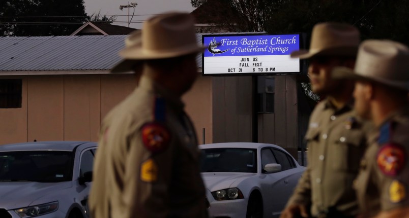Law enforcement officials work at the scene of a shooting at the First Baptist Church of Sutherland Springs, Monday, Nov. 6, 2017, in Sutherland Springs, Texas. A man dressed in black tactical-style gear and armed with an assault rifle opened fire inside the church in the small South Texas community on Sunday, killing and wounding many. The dead ranged in age from 5 to 72 years old. (AP Photo/Eric Gay)