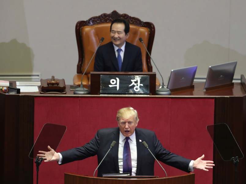 U.S. President Donald Trump delivers a speech as South Korea's National Assembly Speaker Chung Sye-kyun, top, listens at the National Assembly in Seoul, South Korea, Wednesday, Nov. 8, 2017. (AP Photo/Lee Jin-man, Pool)