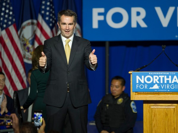 Virginia Gov.-elect Ralph Northam walks onstage to celebrate his election at the Northam For Governor election night party at George Mason University in Fairfax, Va., Tuesday, Nov. 7, 2017. (AP Photo/Cliff Owen)