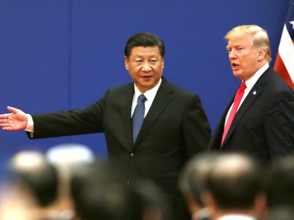U.S. President Donald Trump (R) and China’s President Xi Jinping attend a signing ceremony of US-China Business Exchange at the Great Hall of the People in Beijing on Nov. 9, 2017.( The Yomiuri Shimbun via AP Images )