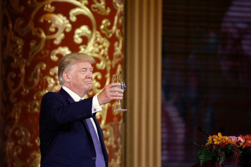 U.S. President Donald Trump attends a state dinner at the Great Hall of the People in Beijing, China, November 9, 2017. REUTERS/Thomas Peter