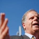 Alabama Democrat Senate candidate Doug Jones speaks to the media, Tuesday, Nov. 14, 2017, in Birmingham, Ala. Jones runs against former judge Roy Moore. (AP Photo/Brynn Anderson)
