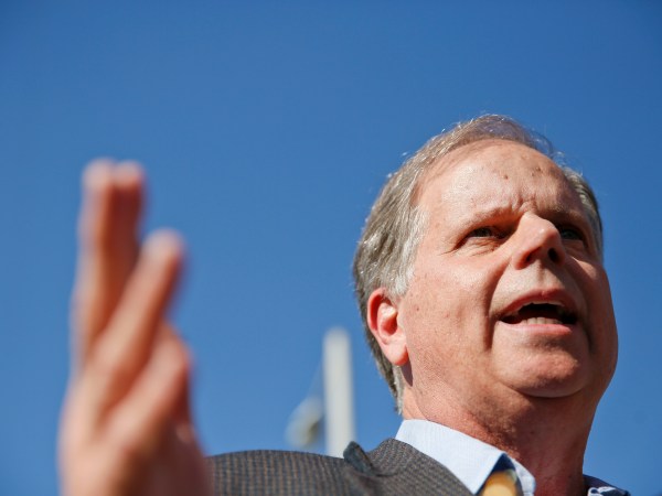 Alabama Democrat Senate candidate Doug Jones speaks to the media, Tuesday, Nov. 14, 2017, in Birmingham, Ala. Jones runs against former judge Roy Moore. (AP Photo/Brynn Anderson)