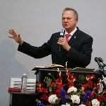 Former Alabama Chief Justice and U.S. Senate candidate Roy Moore speaks at a revival, Tuesday, Nov. 14, 2017, in Jackson, Ala. (AP Photo/Brynn Anderson)