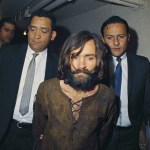 FILE - In this 1969 file photo, Charles Manson is escorted to his arraignment on conspiracy-murder charges in connection with the Sharon Tate murder case. (AP Photo/File)