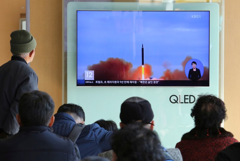 People watch a TV screen showing a file footage of North Korea's missile launch, at Seoul Railway Station in Seoul, South Korea, Tuesday, Nov. 21, 2017. U.S. President Donald Trump announced Monday the U.S. is putting North Korea's "murderous regime" on America's terrorism blacklist, despite questions about Pyongyang's support for international attacks beyond the assassination of its leader's half brother in February. (AP Photo/Ahn Young-joon)