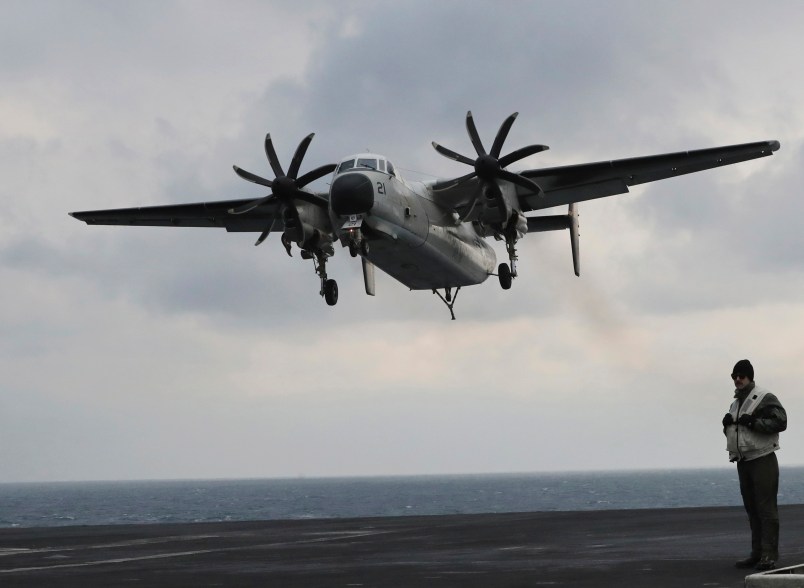 A U.S. Navy C-2 Greyhound approaches the deck of the Nimitz-class aircraft carrier USS Carl Vinson during the annual joint military exercise called Foal Eagle between South Korea and the United States at an unidentified location in the international waters, east of the Korean Peninsula, Tuesday, March 14, 2017. (AP Photo/Lee Jin-man)