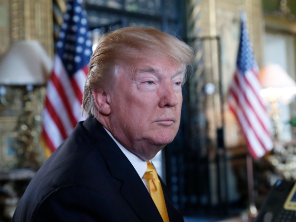 President Donald Trump pauses while speaking to the media before speaking with troops via video conference at Mar-a-Lago, on Thanksgiving, Thursday, Nov. 23, 2017, in Palm Beach, Fla. (AP Photo/Alex Brandon)