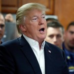 President Donald Trump speaks with members of the U.S. Coast Guard, at the Lake Worth Inlet Station, on Thanksgiving, Thursday, Nov. 23, 2017, in Riviera Beach, Fla. (AP Photo/Alex Brandon)