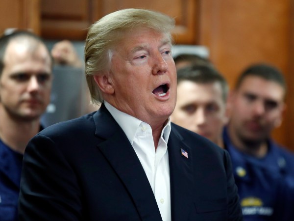 President Donald Trump speaks with members of the U.S. Coast Guard, at the Lake Worth Inlet Station, on Thanksgiving, Thursday, Nov. 23, 2017, in Riviera Beach, Fla. (AP Photo/Alex Brandon)
