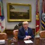 President Donald Trump, flanked by empty seats for Senate Minority Leader Sen. Chuck Schumer of N.Y., left, and House Minority Leader Nancy Pelosi of Calif., right, speaks in the Roosevelt Room of the White House in Washington, Tuesday, Nov. 28, 2017, during a meeting with Republican congressional leaders. (AP Photo/Susan Walsh)