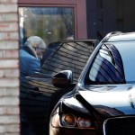 Rep. John Conyers, D-Mich., leaves his home Wednesday, Nov. 29, 2017, in Detroit. Rep. Conyers is being pressured by some in Washington to resign. Rep. Conyers recently stepped down from his post as top Democrat on the House Judiciary Committee after facing allegations of sexual harassment by former staffers. (AP Photo/Paul Sancya)