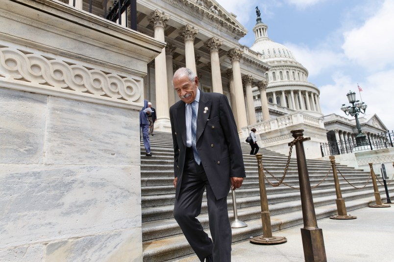 Rep. John Conyers, D-Mich., walks down the steps of the House of Representatives after final votes, at the Capitol in Washington, Friday, May 30, 2014. Michigan election officials announced Friday that they won't appeal a decision that puts the 85-year-old Detroit lawmaker on the August primary ballot. Earlier this month, hundreds of signatures for Conyers’ candidacy were disqualified because of voter registration problems. (AP Photo/J. Scott Applewhite)