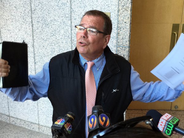 Flip Benham talks to the media about his opposition to the city's anti-discrimination ordinance outside the Meeting Chamber during a break at the Charlotte City Council meeting on Monday, May 23, 2016. The City Council decided to take the discussion of the repeal of the city's anti-discrimination ordinance off the agenda for the meeting.