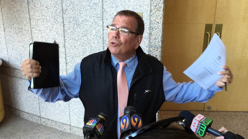 Flip Benham talks to the media about his opposition to the city's anti-discrimination ordinance outside the Meeting Chamber during a break at the Charlotte City Council meeting on Monday, May 23, 2016. The City Council decided to take the discussion of the repeal of the city's anti-discrimination ordinance off the agenda for the meeting.
