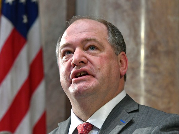 Kentucky Speaker of the House Jeff Hoover looks up to the cheers from the gallery following his swearing in, Tuesday, Jan. 3, 2017, in Frankfort, Ky. Hoover is the first Republican Speaker since 1921. (AP Photo/Timothy D. Easley)