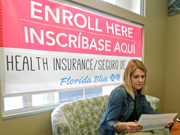 Catherine Reviati reviews the different Affordable Care Act enrollment options, Thursday, Nov.2, 2017, in Hialeah, Fl. Health care advocacy groups are making an against-all-odds effort to sign people up despite confusion and hostility fostered by Republicans opposed to former President Barack Obama’s signature domestic policy achievement. (AP Photo/Alan Diaz)