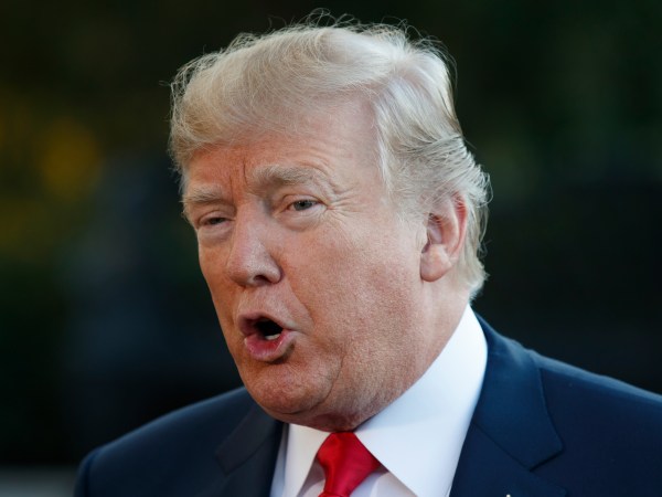 President Donald Trump speaks with reporters before departing the White House for a trip to Asia, Friday, Nov. 3, 2017, in Washington. (AP Photo/Evan Vucci)