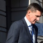 Former Trump national security adviser Michael Flynn leaves federal court in Washington, Friday, Dec. 1, 2017. (AP Photo/Susan Walsh)
