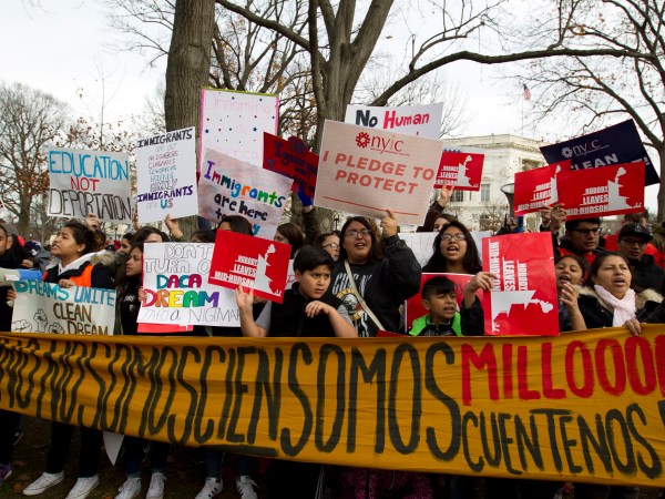 Demonstrators march during an Immigration rally in support of the Deferred Action for Childhood Arrivals (DACA), and Temporary Protected Status (TPS), programs, at Capitol Hill in Washington, Wednesday, Dec. 6, 2017. ( AP Photo/Jose Luis Magana)