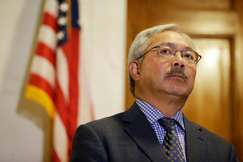San Francisco Mayor Ed Lee listens to questions during a news conference at City Hall Tuesday, Aug. 15, 2017, in San Francisco. San Francisco's mayor is calling on federal officials to reject or significantly modify permission for a right-wing political organization called Patriot Prayer to hold a rally in the city on Aug. 26. The National Park Service told the organization its permit to hold a three-hour rally on San Francisco's Crissy Field was approved last week, before the violent encounters in Virginia last weekend. (AP Photo/Eric Risberg)