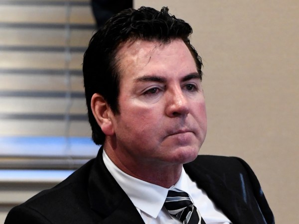 University of Louisville Board of Trustee member John Schnatter listens to the discussion regarding employment of athletic director Tom Jurich, Wednesday, Oct. 18, 2017, in Louisville, Ky. The vote was 10-3 to terminate Jurich with Schnatter voting with the majority. (AP Photo/Timothy D. Easley)