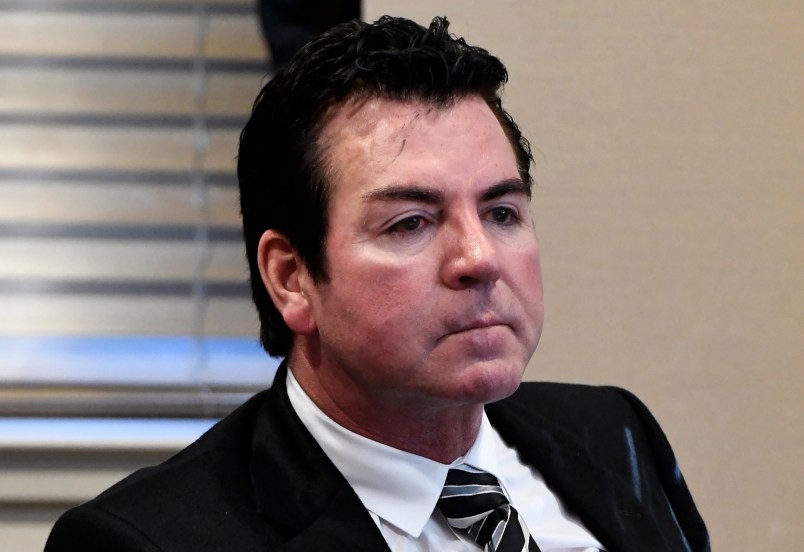 University of Louisville Board of Trustee member John Schnatter listens to the discussion regarding employment of athletic director Tom Jurich, Wednesday, Oct. 18, 2017, in Louisville, Ky. The vote was 10-3 to terminate Jurich with Schnatter voting with the majority. (AP Photo/Timothy D. Easley)