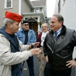 ** ADVANCE FOR WEEKEND EDITIONS, OCT. 25-26 ** Eric Massa, Democratic candidate for New York's 29th Congressional District, right, talks with Gene Simes, left, before accepting the endorsement of The Veterans of Foreign Wars Political Action Committee in Rochester, N.Y., Tuesday Oct. 14, 2008. A fiscal conservative and a former Republican, the 49-year-old Massa spent 24 years in the Navy, survived a battle with non-Hodgkin's lymphoma in the late 1990s, and talks up his independent streak, a customary stance for challengers of all stripes in upstate New York. (AP Photo/David Duprey)