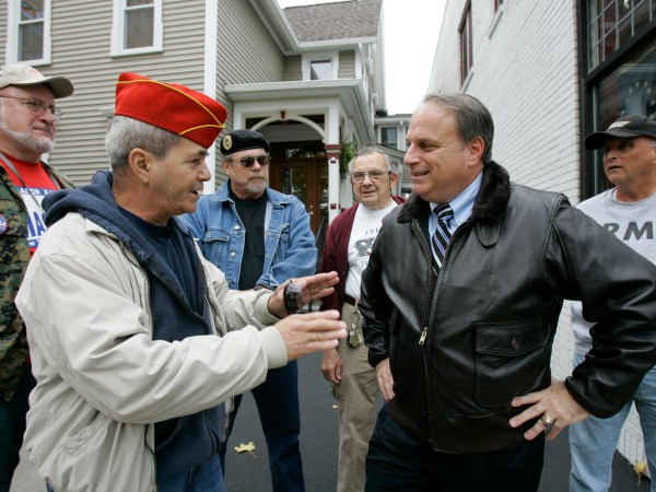 ** ADVANCE FOR WEEKEND EDITIONS, OCT. 25-26 ** Eric Massa, Democratic candidate for New York's 29th Congressional District, right, talks with Gene Simes, left, before accepting the endorsement of The Veterans of Foreign Wars Political Action Committee in Rochester, N.Y., Tuesday Oct. 14, 2008. A fiscal conservative and a former Republican, the 49-year-old Massa spent 24 years in the Navy, survived a battle with non-Hodgkin's lymphoma in the late 1990s, and talks up his independent streak, a customary stance for challengers of all stripes in upstate New York. (AP Photo/David Duprey)