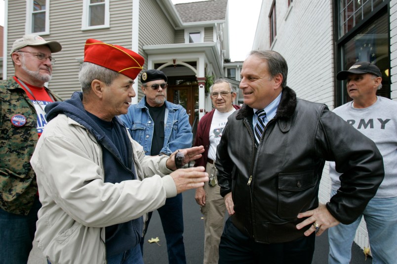 ** ADVANCE FOR WEEKEND EDITIONS, OCT. 25-26 ** Eric Massa, Democratic candidate for New York's 29th Congressional District, right, talks with Gene Simes, left, before accepting the endorsement of The Veterans of Foreign Wars Political Action Committee in Rochester, N.Y., Tuesday Oct. 14, 2008. A fiscal conservative and a former Republican, the 49-year-old Massa spent 24 years in the Navy, survived a battle with non-Hodgkin's lymphoma in the late 1990s, and talks up his independent streak, a customary stance for challengers of all stripes in upstate New York. (AP Photo/David Duprey)